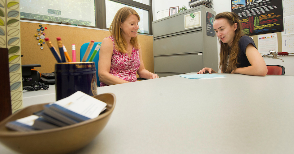 Julie McGilvray, Undergraduate Advisor for the Arts meet with Devon Bradshaw, a double major in Music and Statistics.