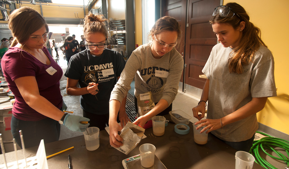 (l to r) Kelly Gifford, Grace Sayre, Bridget McLoughlin (Viticulture and Enoloy majors) and Jill Bilodeaux, a biotechnology major, work to record and make their varied yeast mixtures during grape crush class in the winery at Robert Mondavi Institute on September 30, 2016 at UC Davis. The goal of the class is to give students practical experience in winemakeing on a small scale so that they can make errors on a small scale.
