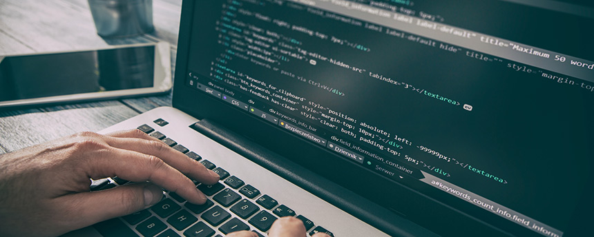 A person working on computer code
