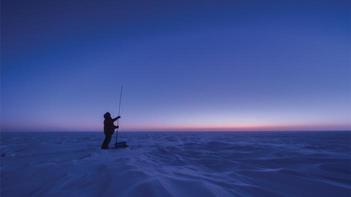 1300hrs A man stands on a snowy plain