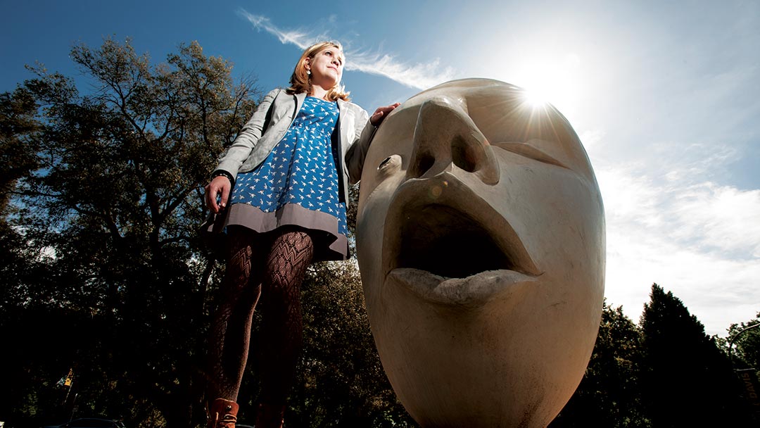 20150330_art_tours_2927 A woman stands by one of the campus' Eggheads.