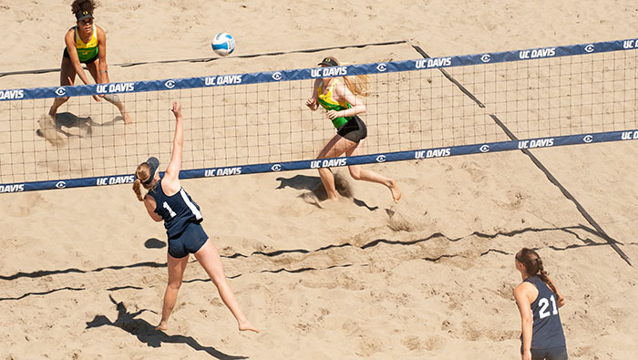 Savanah Schroeder (#1) and Heather Reed (#21) compete in the deciding beach volleyball match against Oregon on April 12, 2019. UC Davis won 3 to 2.