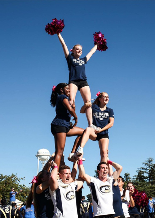 Megan-Bull_Pyramid-inset-web Megan Bull at the top of the pyramid with the UC Davis Cheer Team