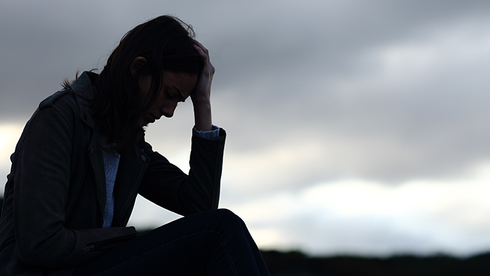 Postvention-700x395 Silhouette of sad woman