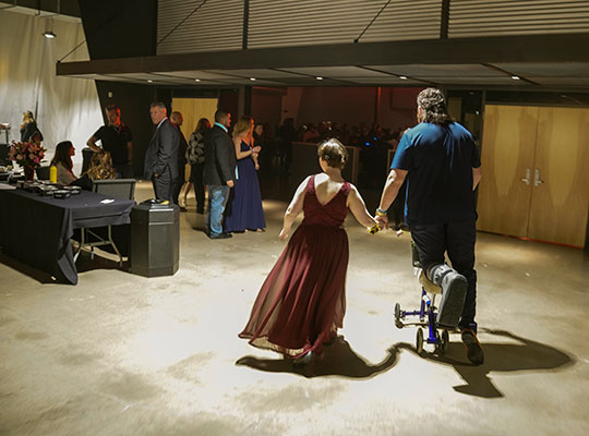 Prom-web-2 Kooper Richardson, who recently had ankle surgery used a scooter to spare his foot for dancing with Montana Klentz, 17.