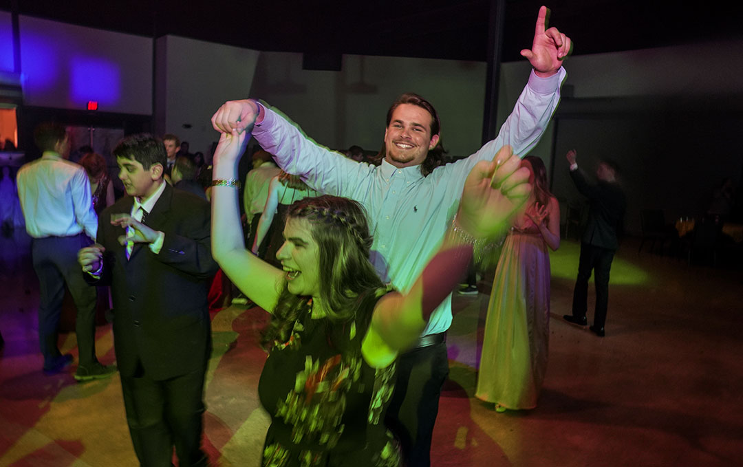 Prom-web-3 Hana Weeks, 21, came alive on the dance floor with Kaden Richardson, Kooper’s brother, an offensive lineman and freshman majoring in communication.