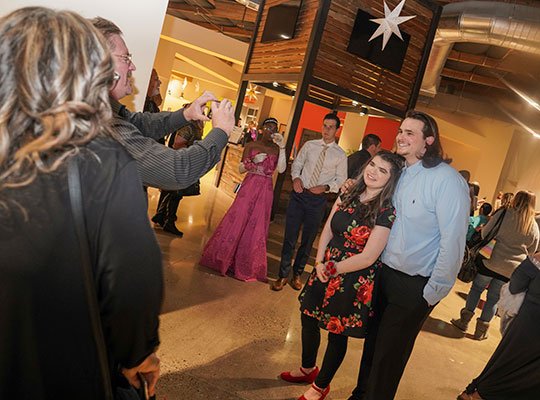 Prom-web-7 Parents Tim and Edit Weeks take photos of daughter Hana with Kaden at the end of the evening.