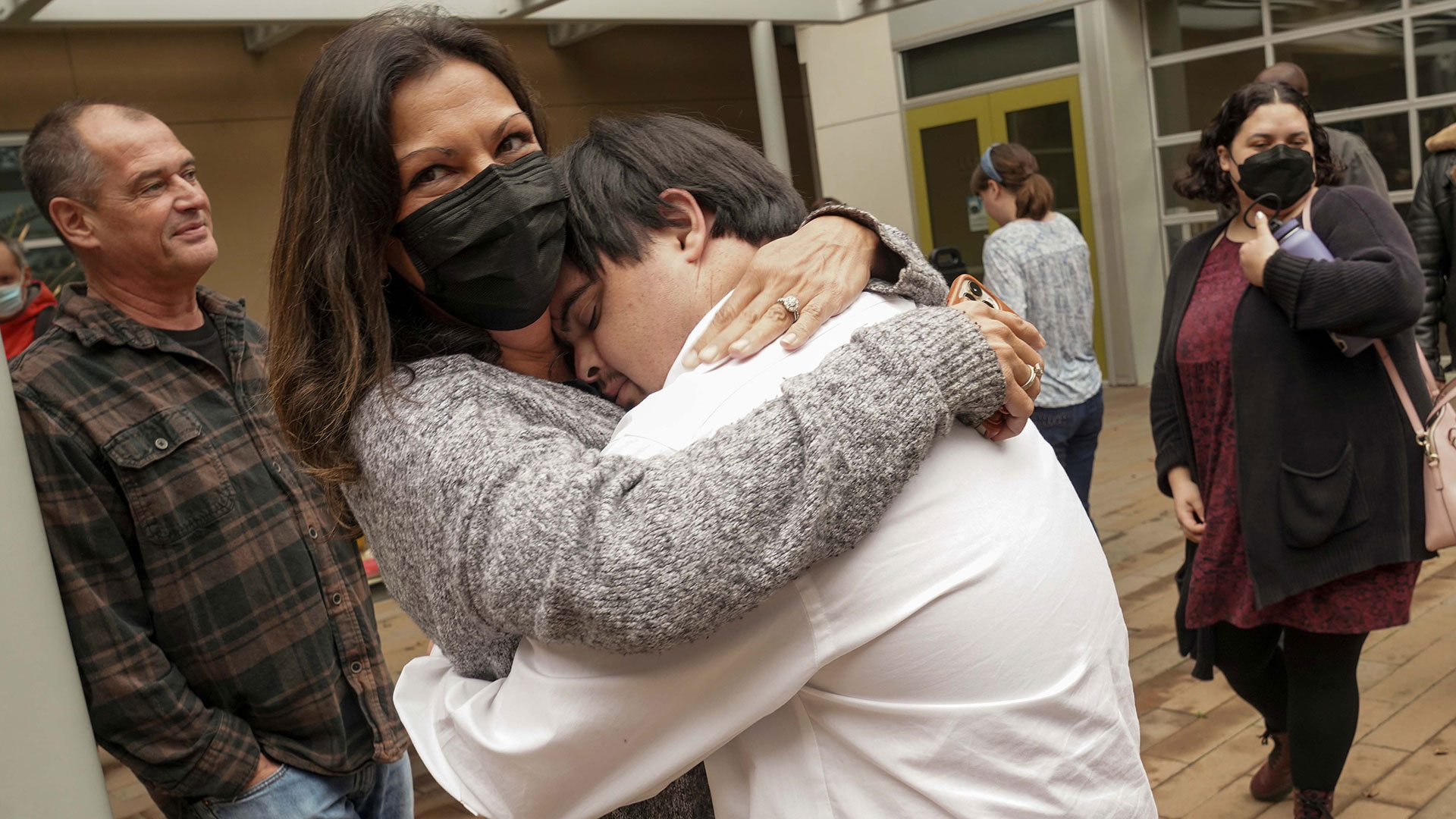 SEED-Scholar-Ryan-Fitch-hugs-his-mom,-Melissa,-after-the-student-exposition-at-the-UC-Davis-International-Center,-Dec.-4,-2021-(2) SEED Scholar Ryan Fitch hugs his mom, Melissa, after the student exposition in December