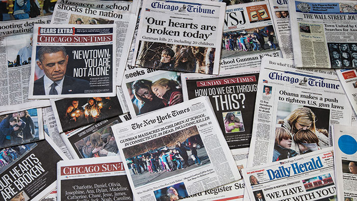 Shooting-Papers-Main Local and national newspapers after the 2012 shooting in Newtown, Connecticut