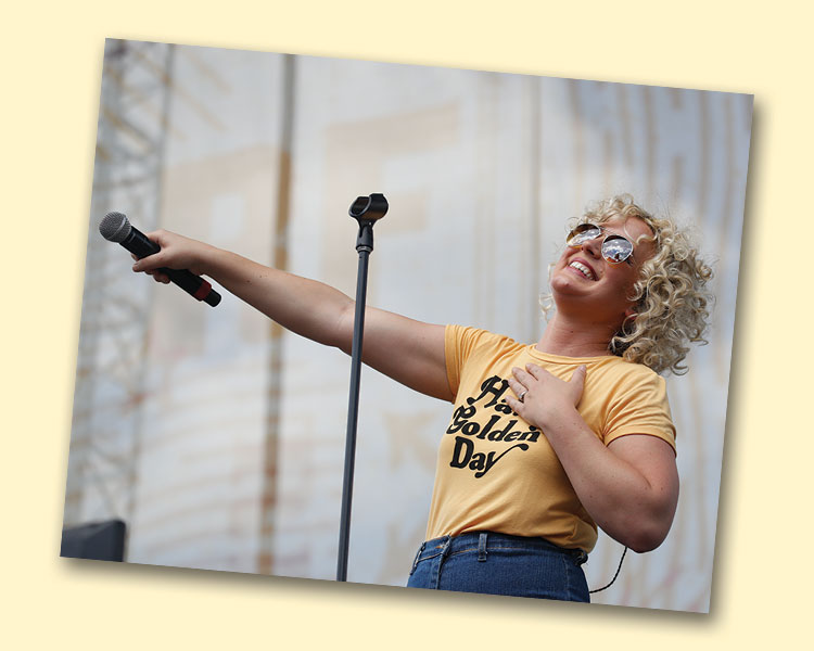 cam-uc-davis-cma-music-festival-nashville-2017 Cam holds a microphone