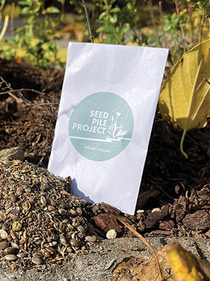 citizen-science-seed-pile3 A packet of seeds sits on the ground ready to be opened and spread