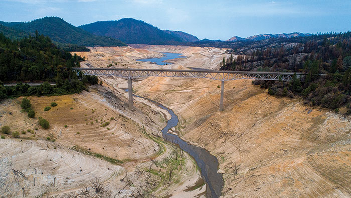drought-explained-web Dry waterway with a bridge crossing