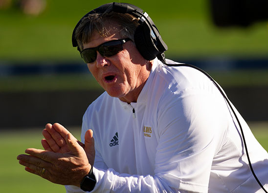football-uc-davis-dan-hawkins-sidelines Dan Hawkins