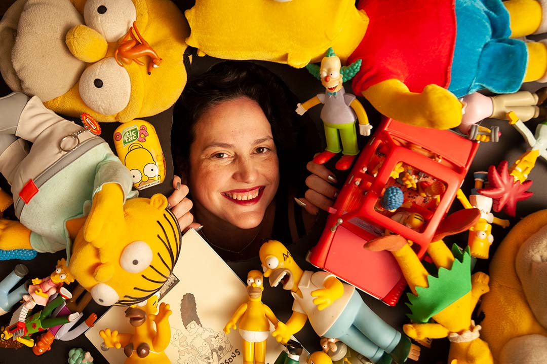 karma-waltonen-uc-davis-simpsons UC Davis Professor Karma Waltonen poses with Simpsons memorabilia
