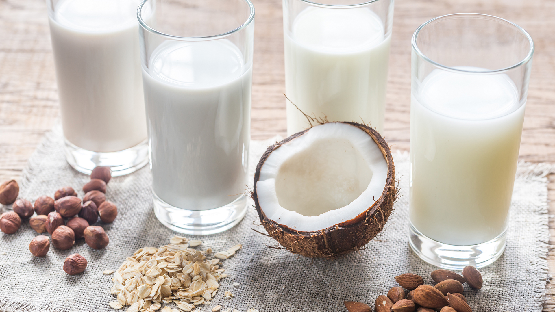 nondairy-milks-web Variety of plant-based milks on a table