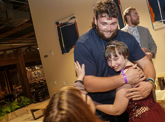 prom-web-6 Klentz hugged Kooper as her mother, Lisa Thompson, asked them to hold still for a photo.
