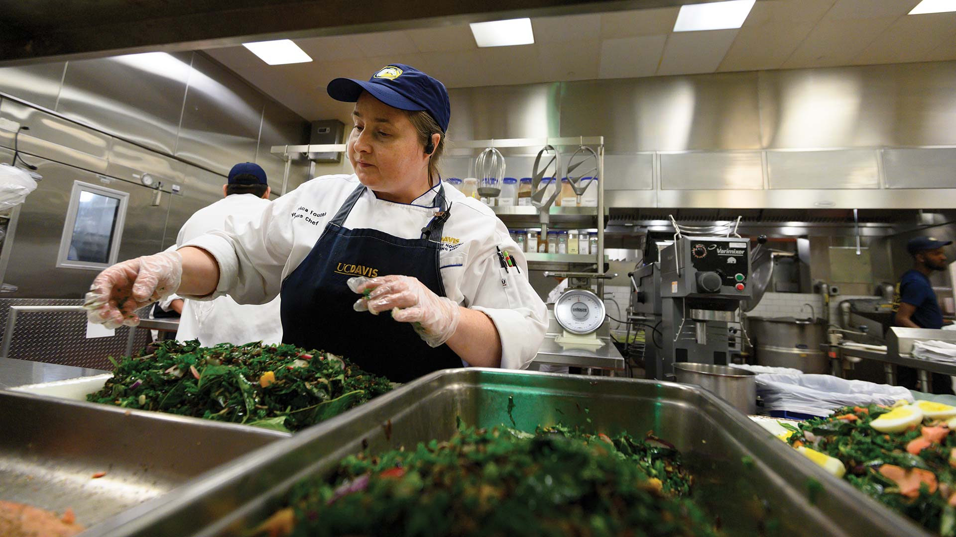 sous-chef-preparing-food A chef prepares fresh greens