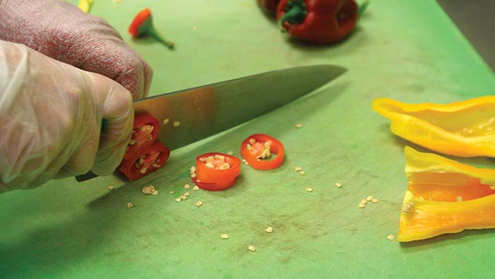 student-farm-peppers Chopping peppers