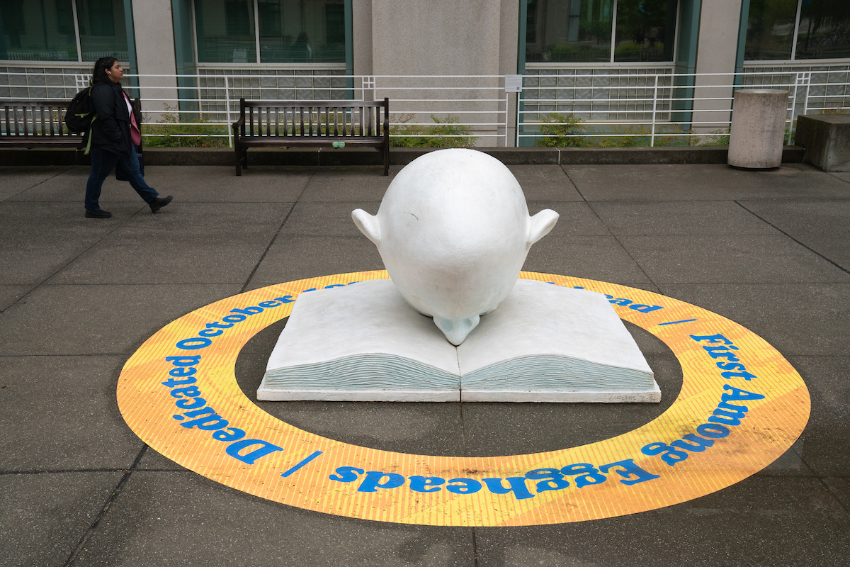 Bookhead Egghead in front of library at UC Davis