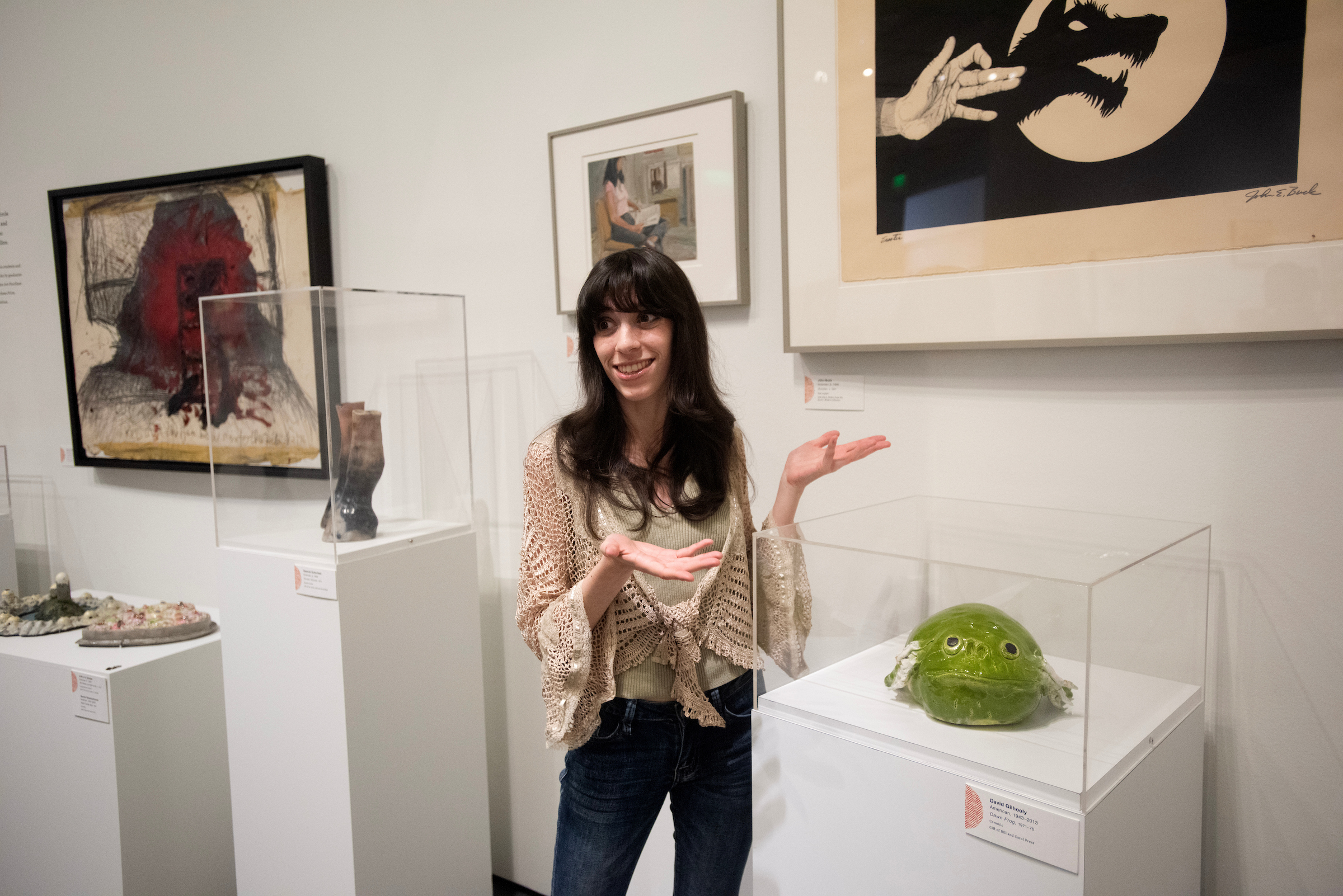 Madeline Madrid, a first-year master's degree student, is excited to see a Gilhooley frog in the exhibition. 