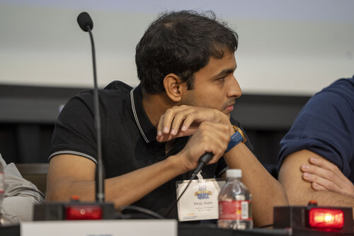 Student prepares to answer a question at UC Davis Biz Quiz competition