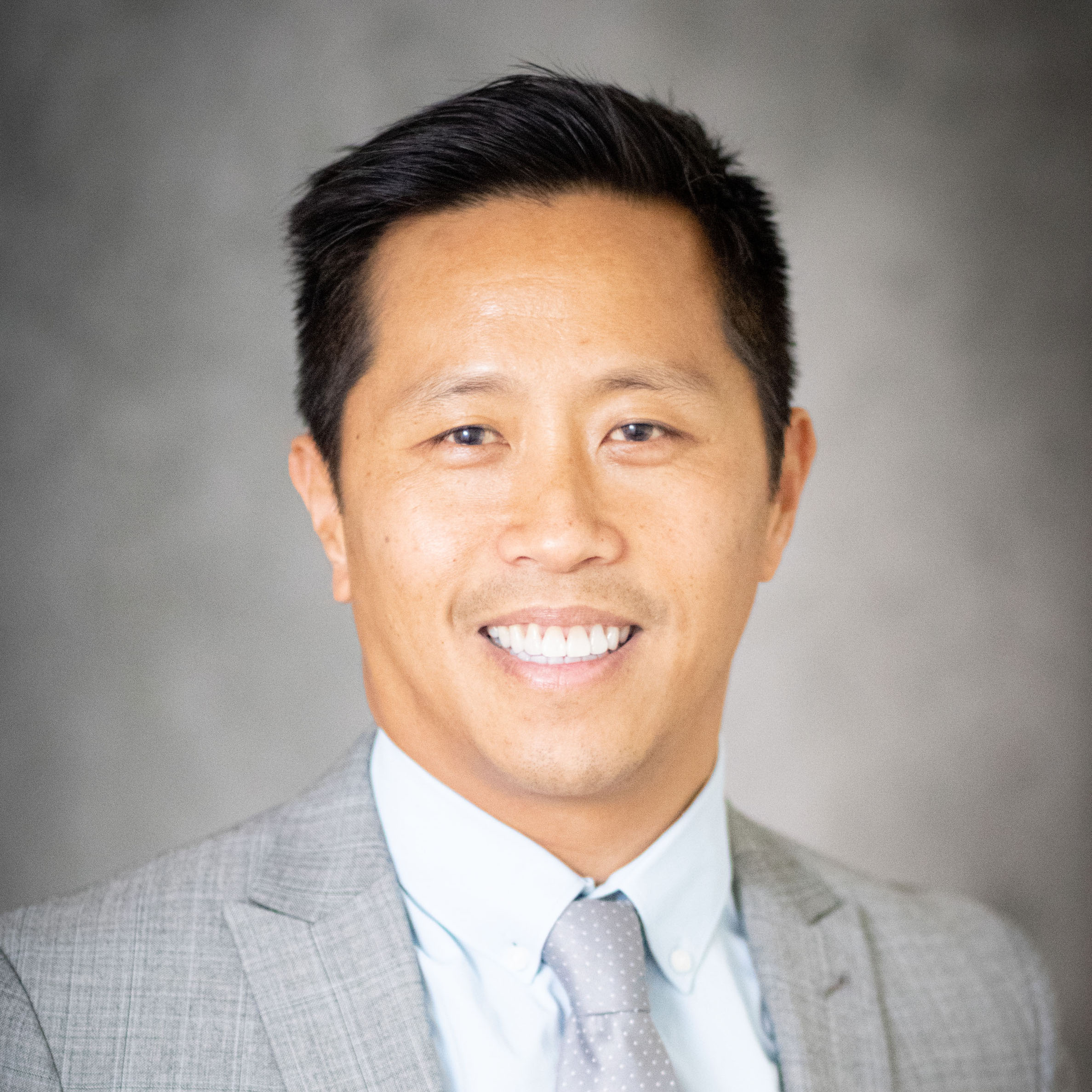 Head shot of Duy Nguyen, a former child refugee from Vietnam and now aspiring psychiatrist.