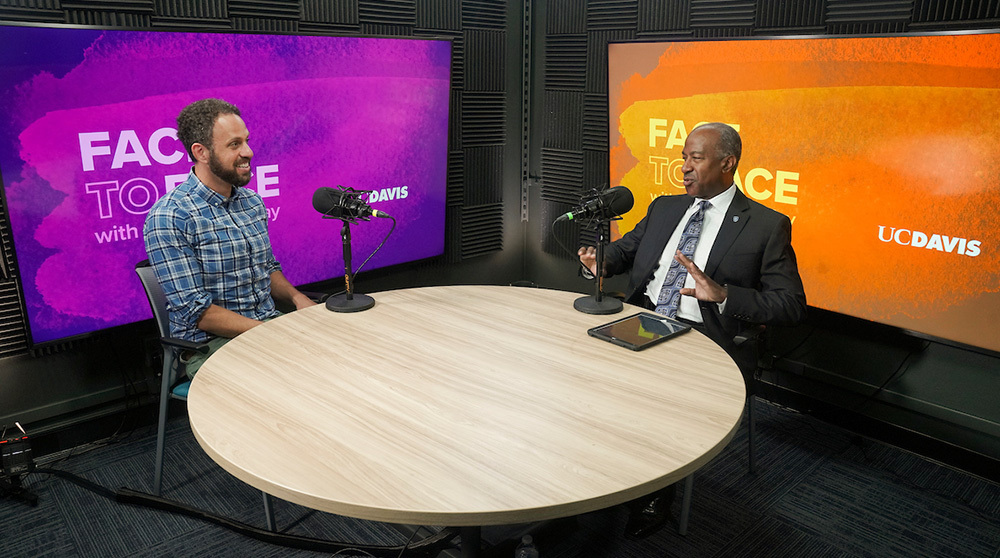 Chancellor Gary May speaks with a guest in the UC Davis video studio