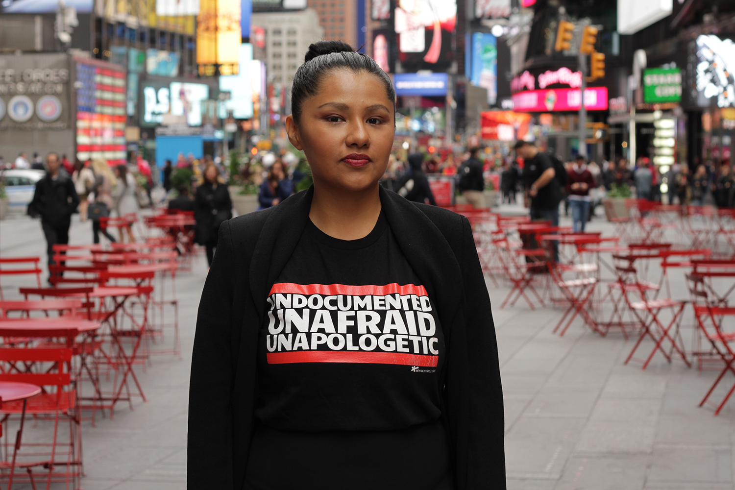 Photo of young woman in black sweatshirt