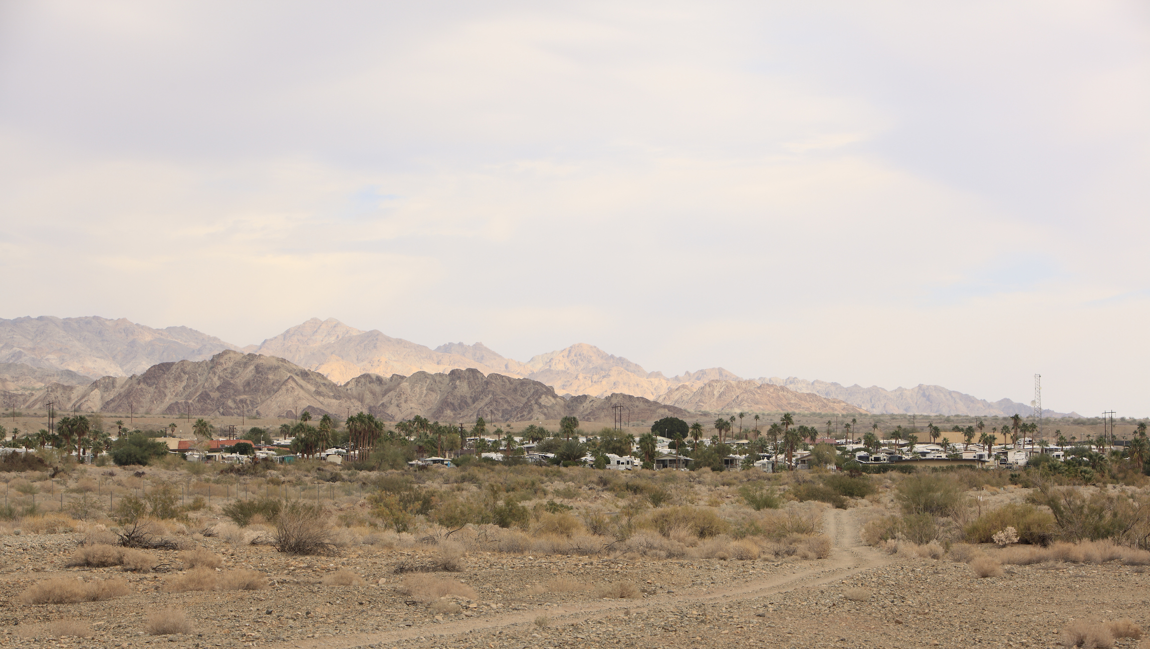 trailers and motorhomes in dry landscape of Salton Sea 