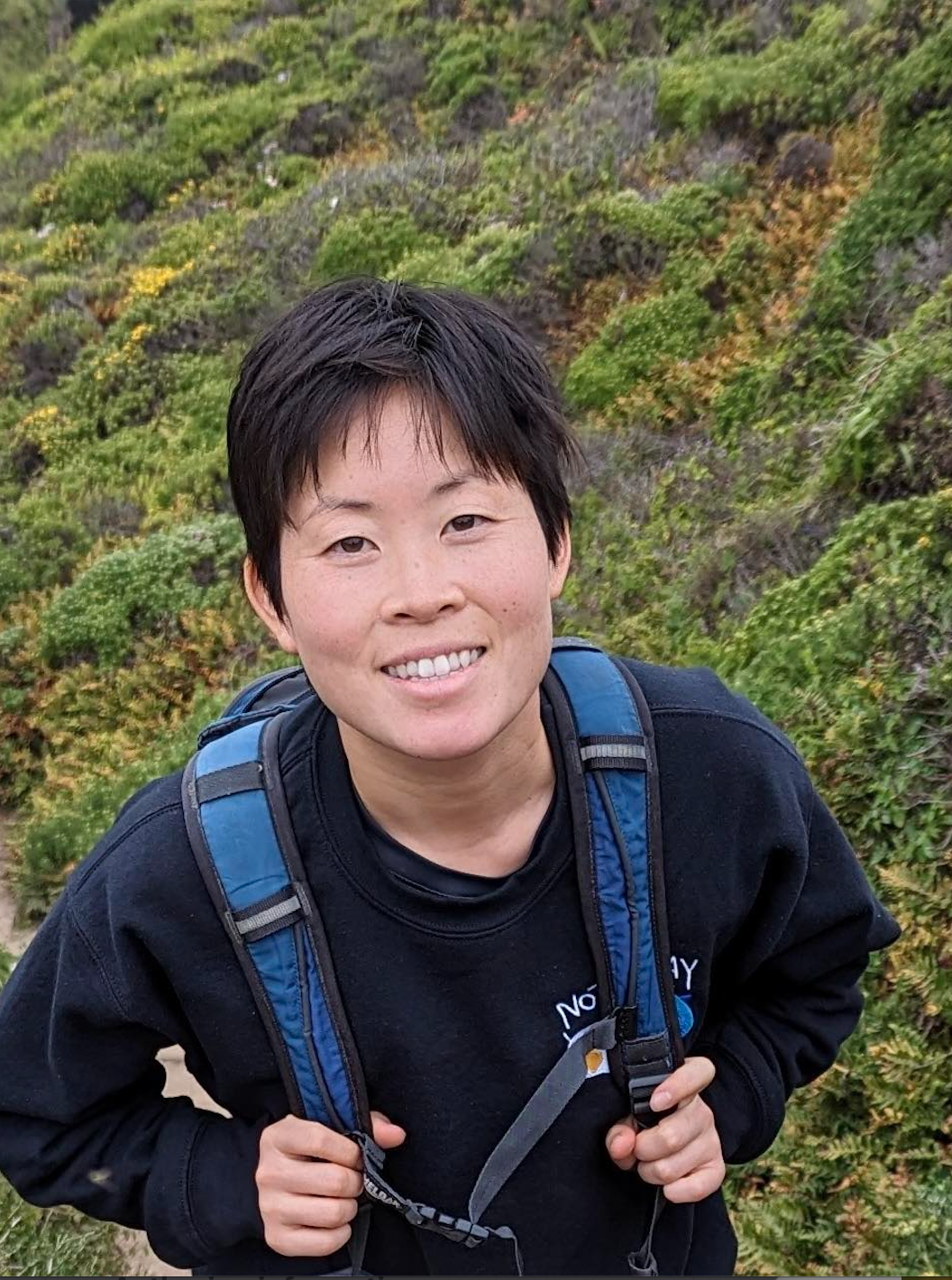 Dana Song posing on a hike