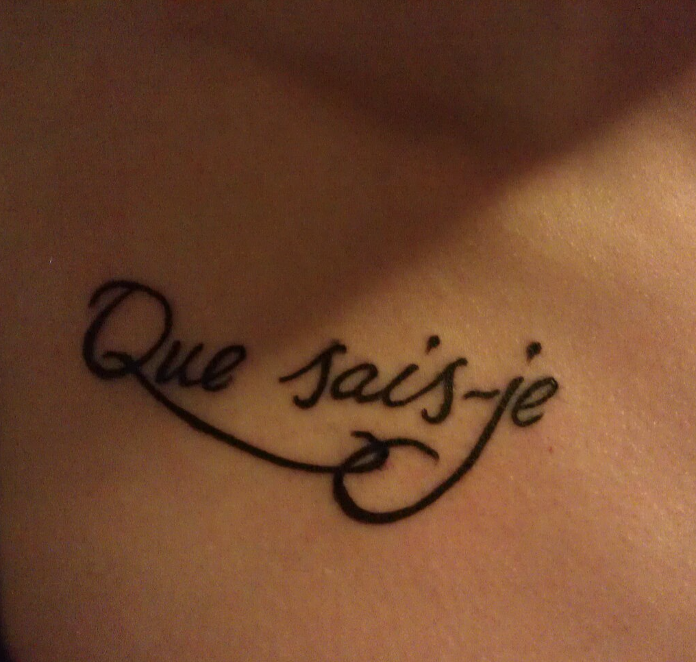 Tattoo of phrase "Que sais-je"