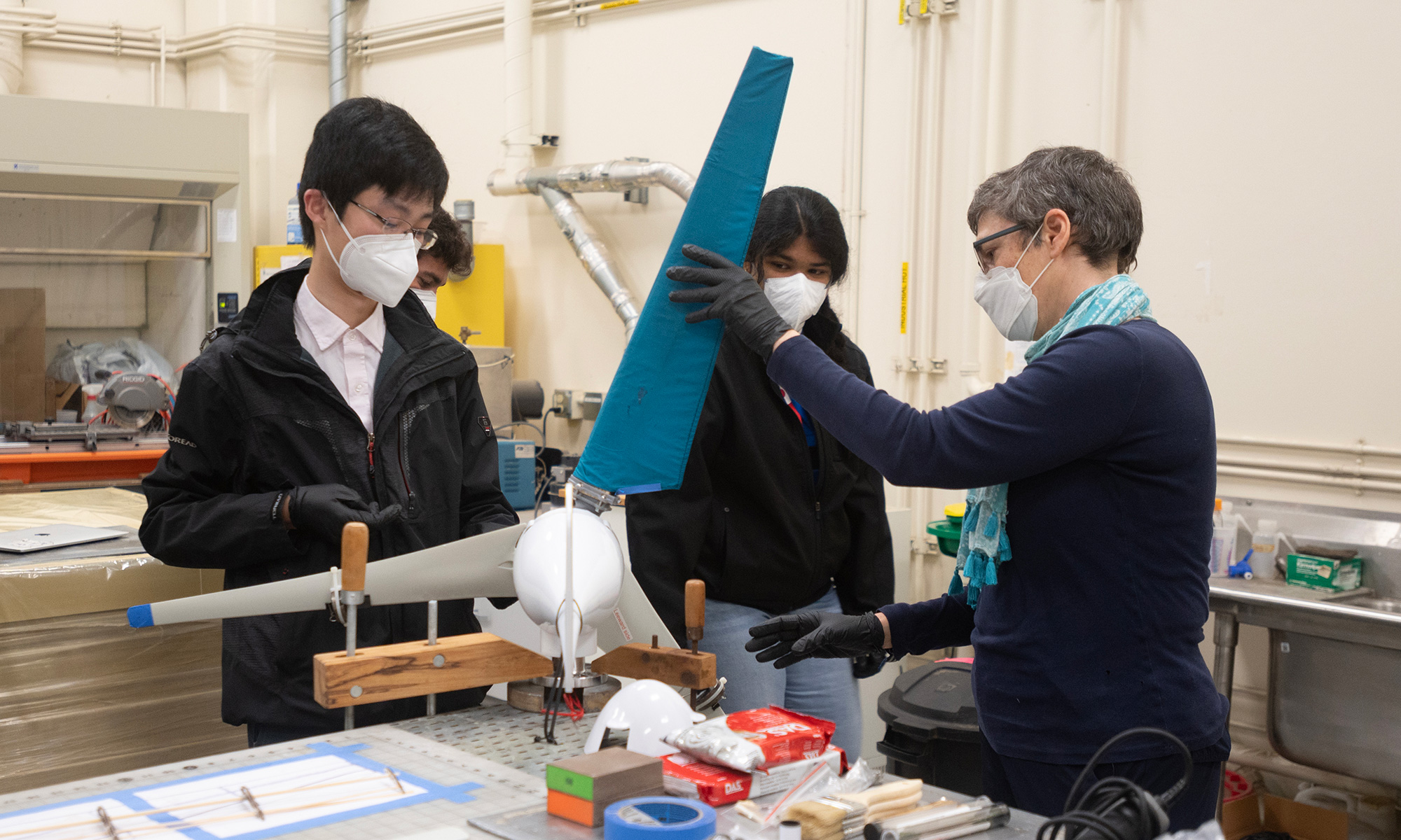 Researchers in a lab show prototype wind turbine blade