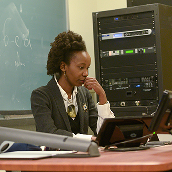 engineering professor studies students homework