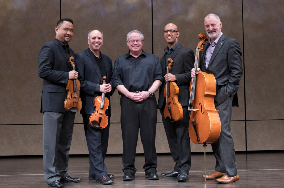 Musicians holding instruments