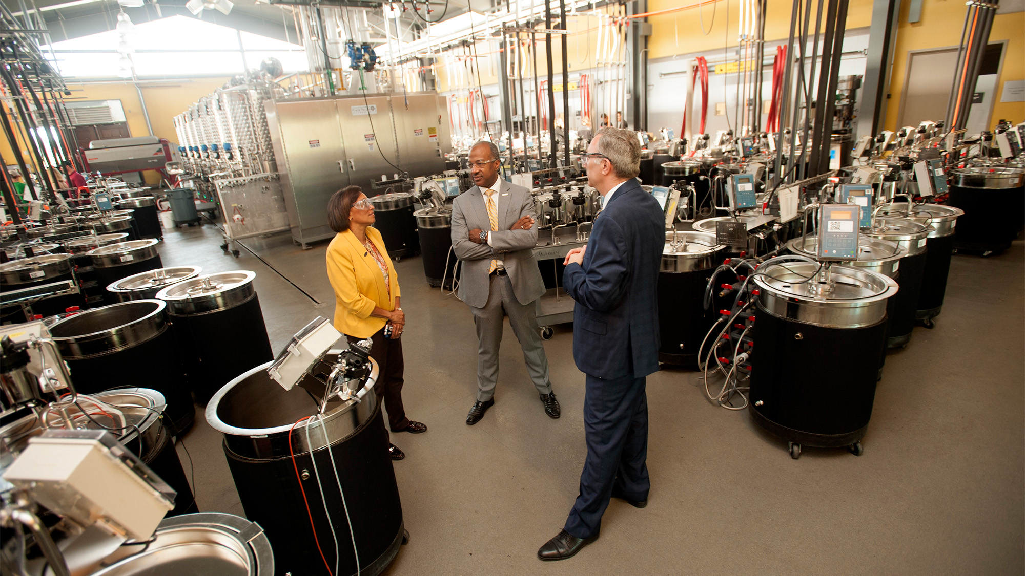 Chancellor May tours a winery