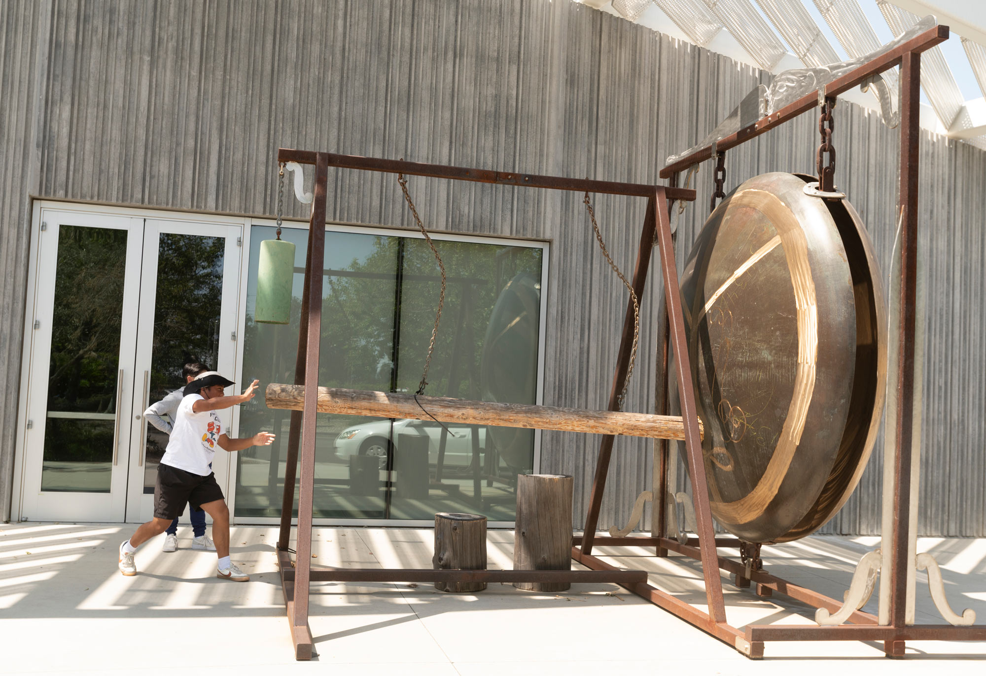 Man strikes the Gong