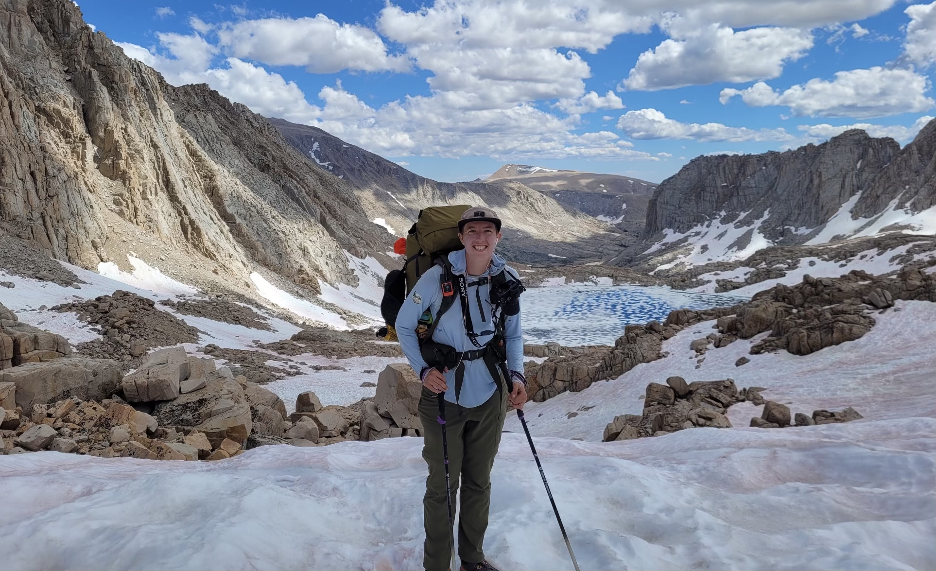 Grace Cureton poses with an alpine vista