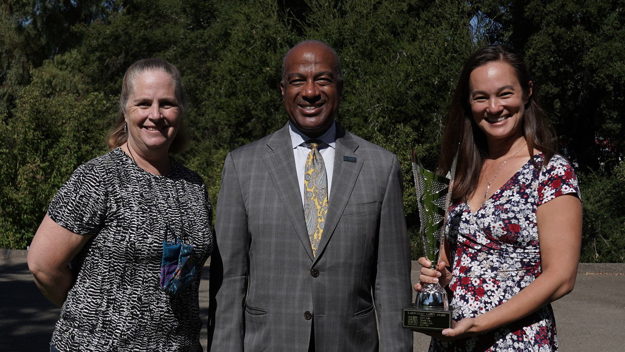 3 people pose for award photo at UC Davis