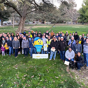 Group photo of people on grass