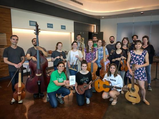 Musicians and their instruments gathered for photo