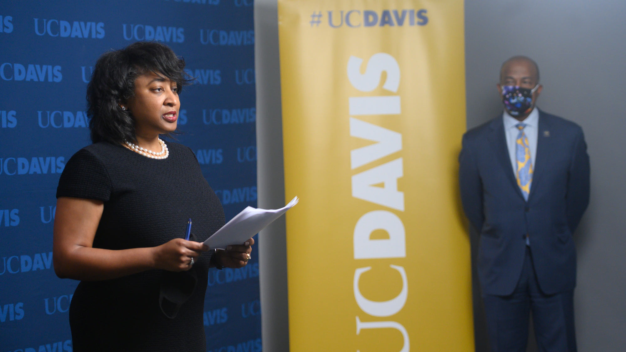 Renetta Garrison Tull addresses online audience; Gary S. May looks on.