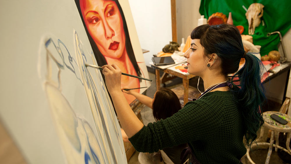 student intern paints