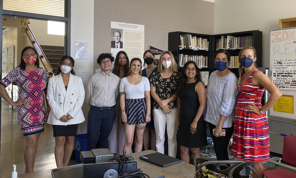 A group of students pose for a photo at UC Davis.