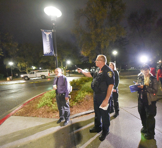 Chief Carmichael and team observe corner lighting.