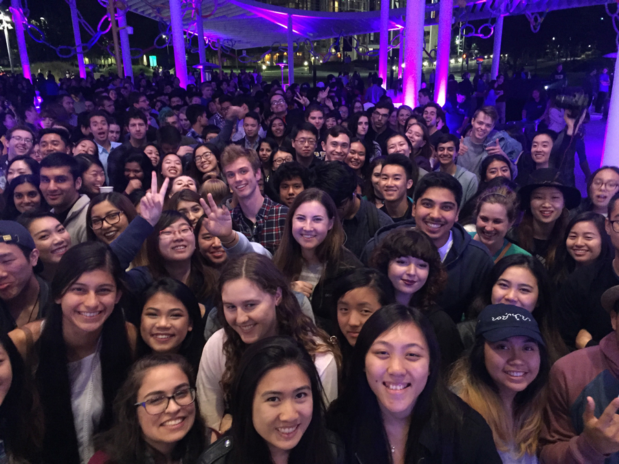 Students wait at museum doors.