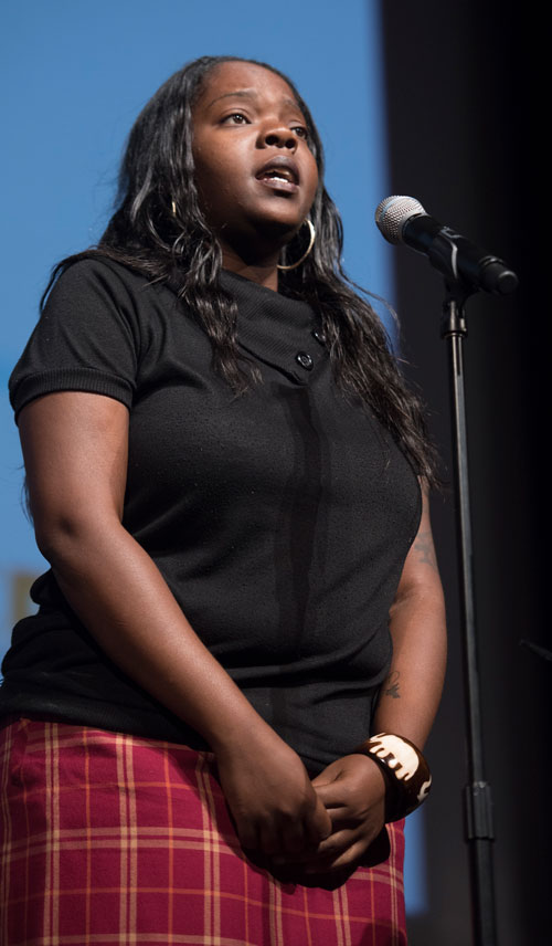 Denisha Bland on stage.