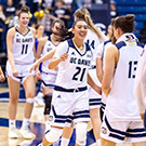 Basketball players celebrate