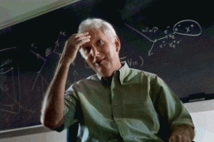 Physics professor Robert Svoboda, scratching his head in front of chalkboard