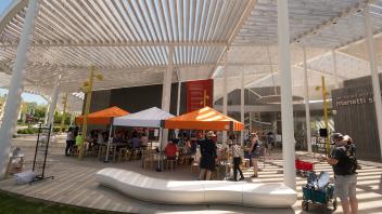 Pop-up tents for Picnic Day activities sit in front of the Manetti Shrem Museum.