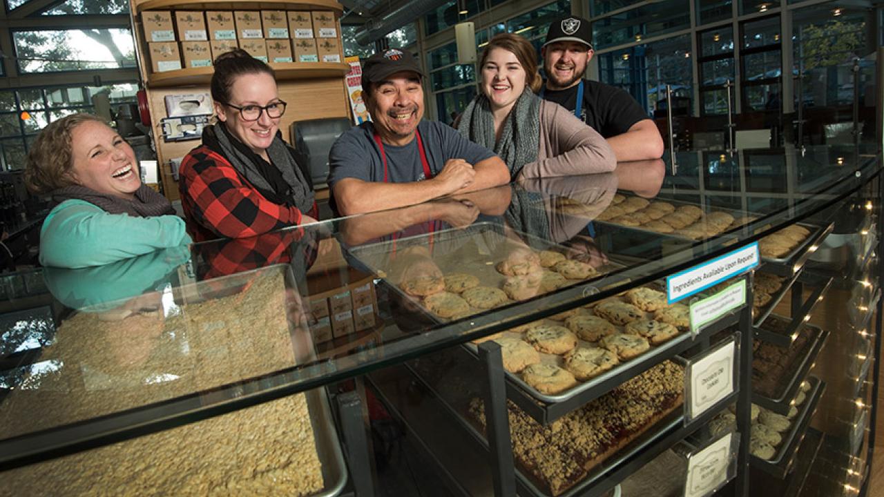 The Coffee House management team poses for a photo.